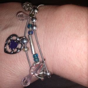 3stretchy silver charm bracelets
